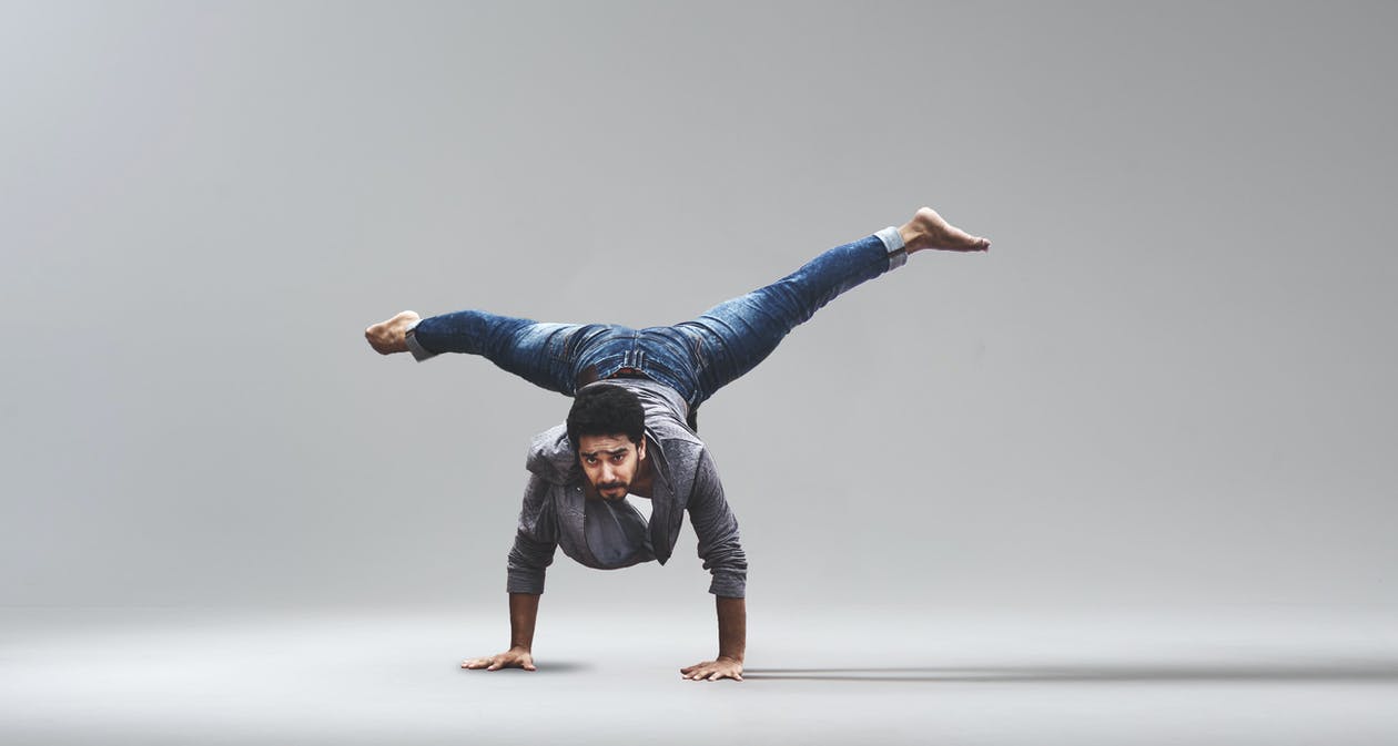 Man Performing Handstand